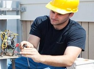 technician fixing wiring